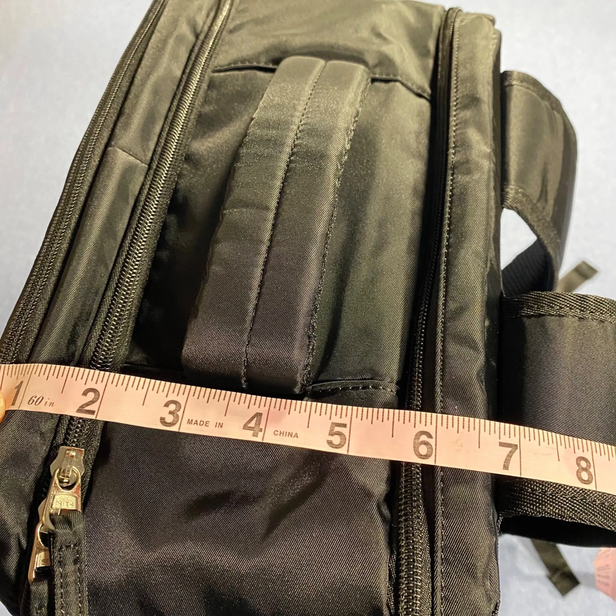 Durable Black Nylon Backpack With Multiple Pockets & Adjustable Straps
