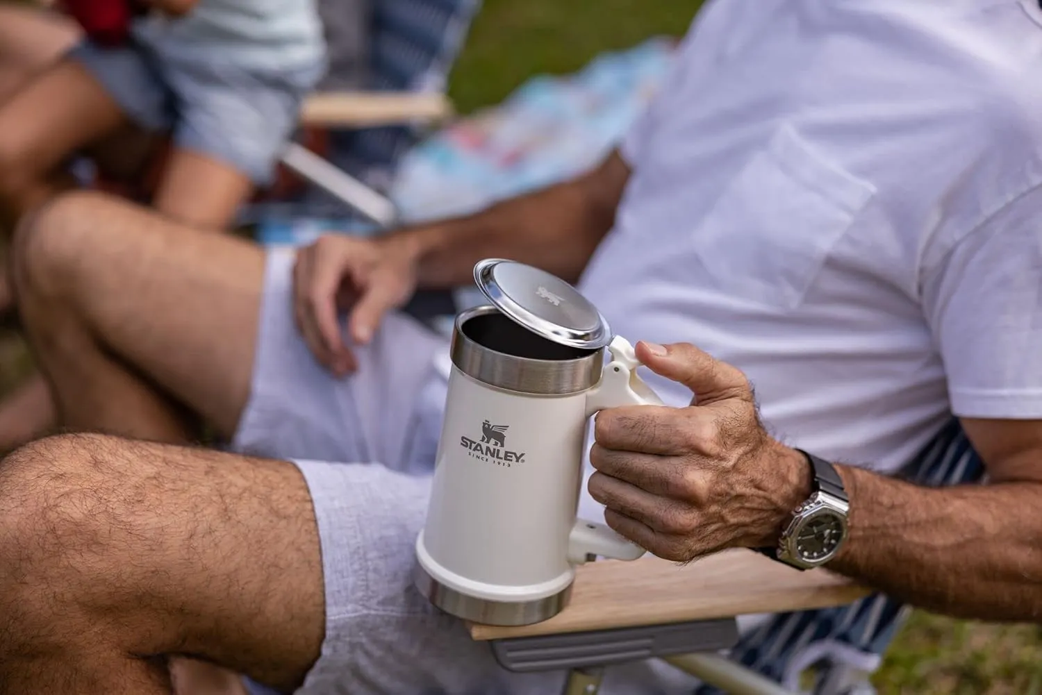 Stanley Classic Bottle Opener Beer Stein 24 oz | Flip Up Lid and Heavy Duty Handle with Built In Bottle Opener | Insulated Stainless Steel Beer Mug | BPA-Free | Cream Gloss
